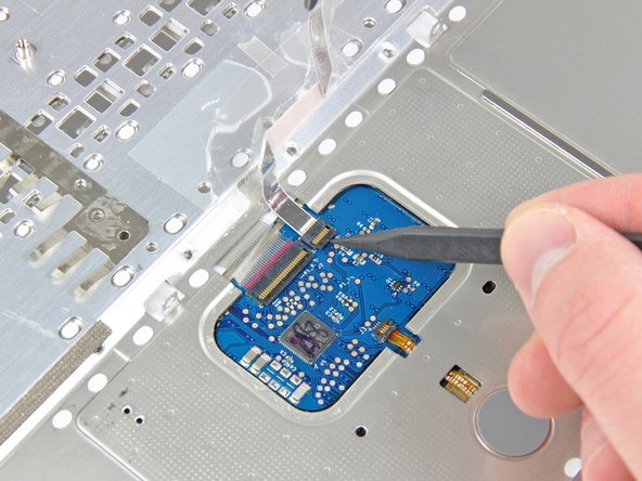 MacBook Core Duo Upper Case Cable Replacement: step 24, image 1 of 2