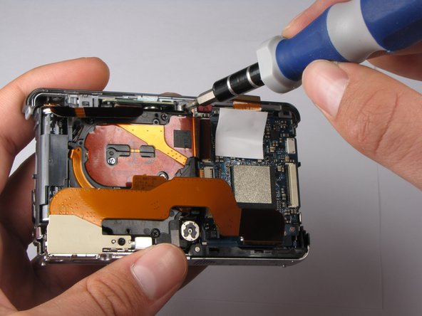 Repairing Sony Cyber-shot DSC-W290 Motherboard: step 15, image 2 of 2