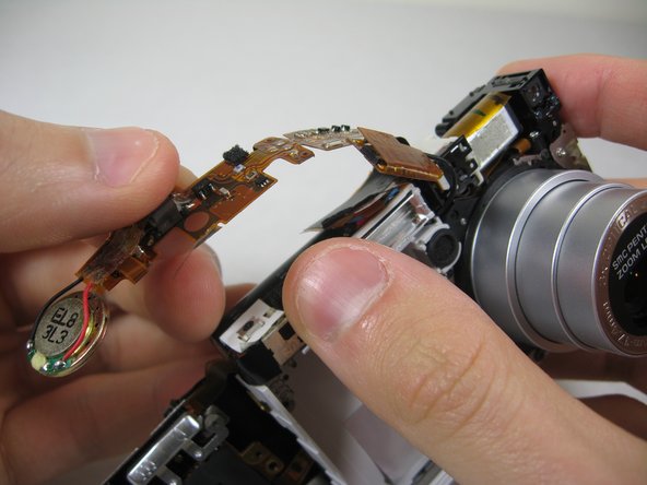 Disassembling Pentax Optio S4i Lens Assembly: step 25, image 1 of 1