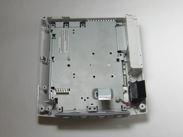 Sega Dreamcast Logic Board Removal: step 20, image 3 of 3