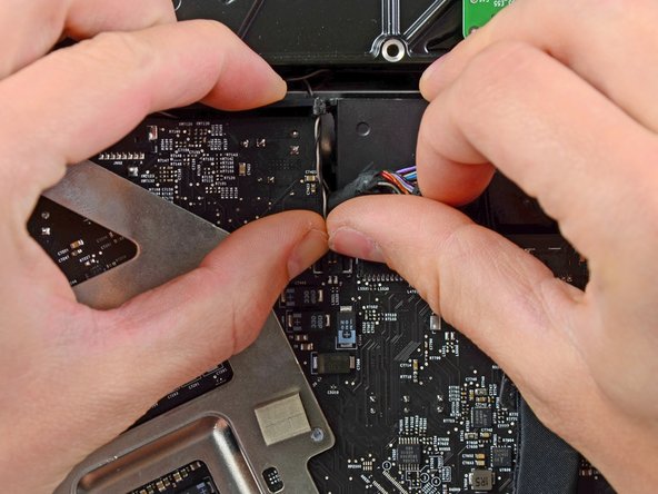 iMac Intel 21.5" EMC 2428 Right Speaker Replacement: step 28, image 1 of 1