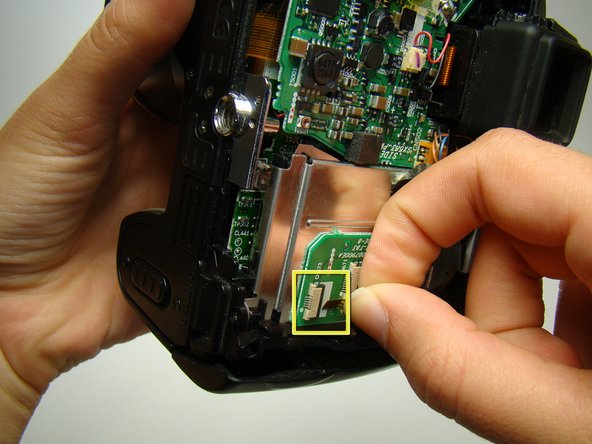 Nikon Coolpix E5700 Viewfinder Replacement: step 16, image 1 of 2