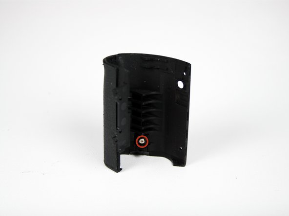 Disassembling Canon EOS Rebel XS Battery Door: step 10, image 1 of 1