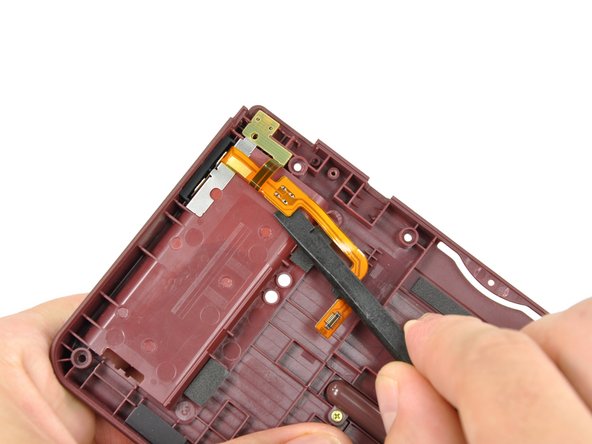 Nintendo DSi XL Volume Control Switch Replacement: step 10, image 1 of 3