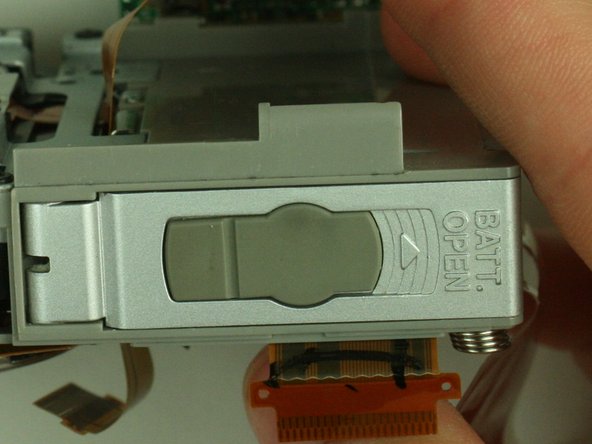 Canon PowerShot S400 Battery Replacement: step 21, image 1 of 1