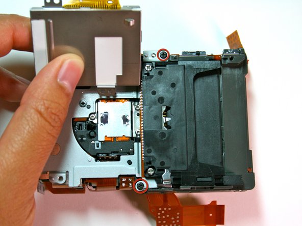 Canon Powershot S200 Camera lens Replacement: step 25, image 1 of 2