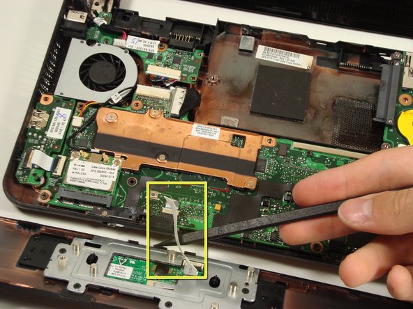 Disassembling Compaq Mini 110 Fan: step 11, image 1 of 2