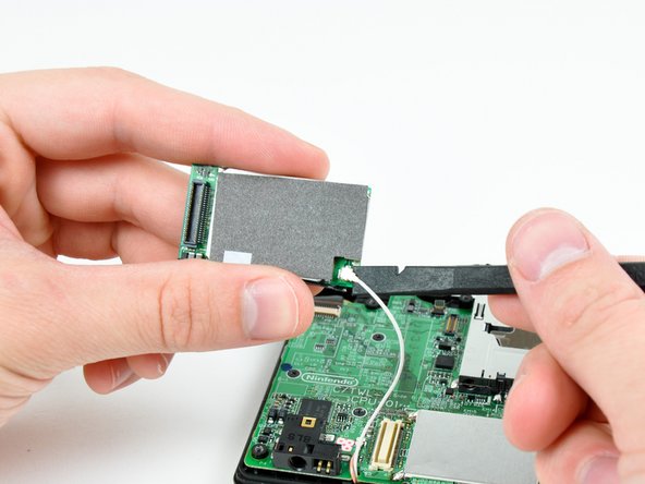 Nintendo DSi Upper LCD/Speakers Replacement: step 8, image 1 of 1