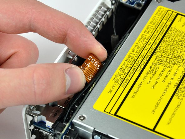 Mac mini Model A1176 Speaker Replacement: step 8, image 1 of 1