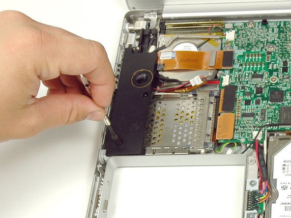 PowerBook G4 Aluminum 15" 1.67 GHz PC Card Cage Replacement: step 12, image 1 of 1