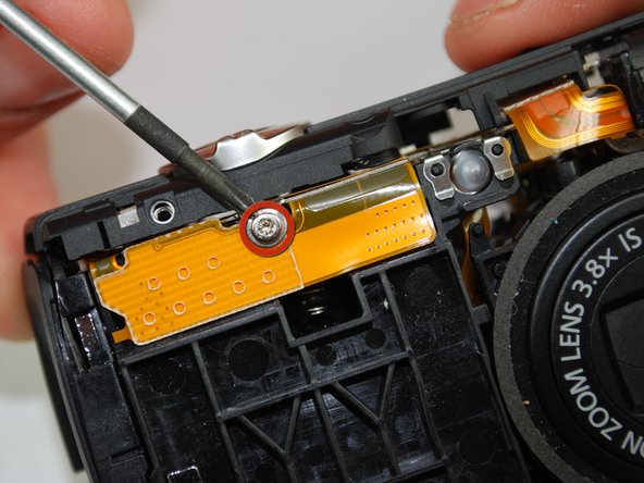 Canon PowerShot SD870 IS Card and Battery Slot Replacement: step 13, image 1 of 2