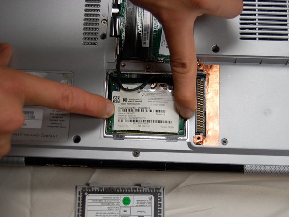 HP Pavilion dv1000 Back Cover Replacement: step 16, image 2 of 3