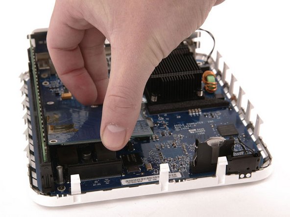 Mac mini (PowerPC) Bluetooth Board Replacement: step 11, image 1 of 1