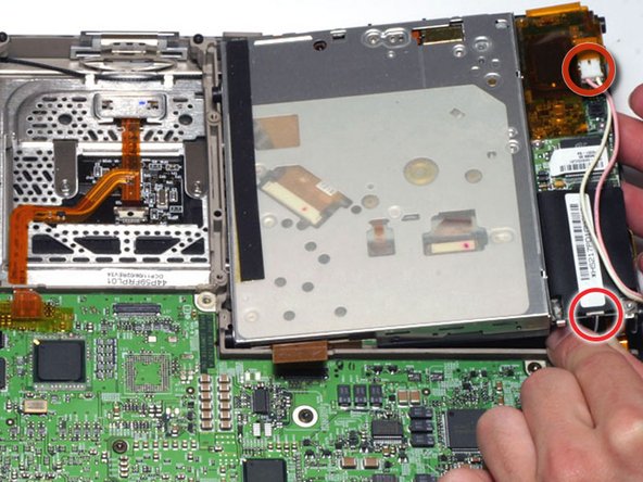 PowerBook G4 Titanium DVI PC Card Cage Replacement: step 16, image 1 of 1