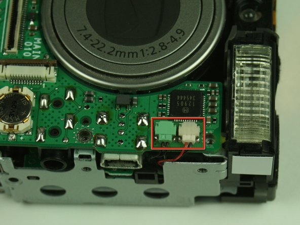 Canon PowerShot S400 Battery Replacement: step 12, image 1 of 2
