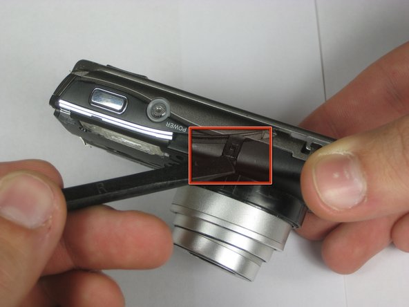 Disassembling Olympus Stylus 1010 Logic Board: step 6, image 2 of 3