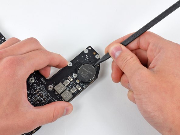 Mac Mini Mid 2010 PRAM Battery Replacement: step 21, image 1 of 1