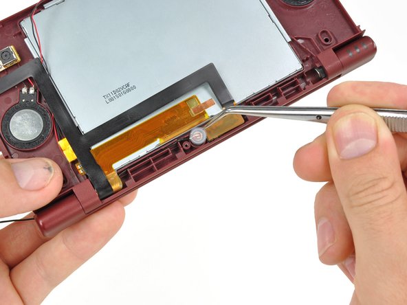 Nintendo DSi XL Front Bezel Replacement: step 32, image 1 of 3