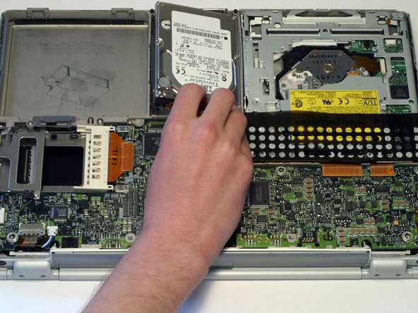 PowerBook G4 Titanium Mercury Upper Case Replacement: step 11, image 1 of 1