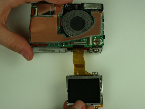 Canon PowerShot S400 Battery Replacement: step 9, image 2 of 2