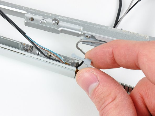 PowerBook G4 Aluminum 17" 1.67 GHz (High-Res) Front Display Bezel Replacement: step 63, image 2 of 2