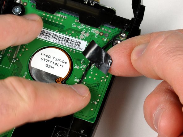 Mac mini Model A1283 Terabyte Drive Replacement: step 14, image 2 of 3