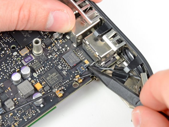 Mac Mini Mid 2011 I/O Bezel Replacement: step 24, image 1 of 1