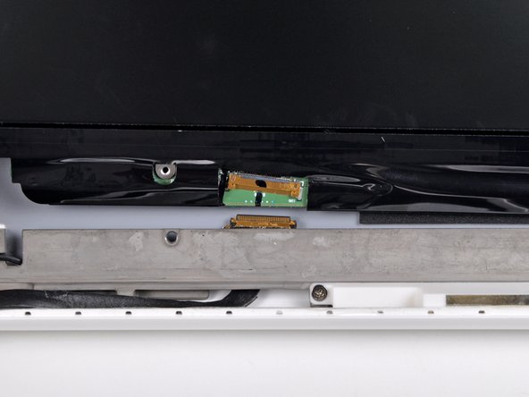 MacBook Unibody Model A1342 Antenna Cables Replacement: step 26, image 2 of 2