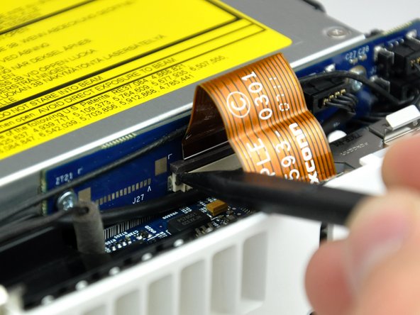 Mac mini Model A1176 Optical Drive Replacement: step 7, image 1 of 2