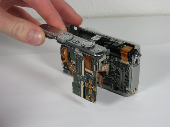 Panasonic Lumix DMC-TZ5 Button Board Replacement: step 10, image 1 of 2