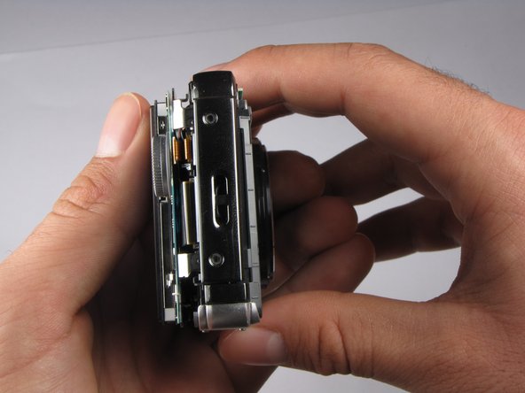 Repairing Sony Cyber-shot DSC-W290 Motherboard: step 9, image 1 of 2