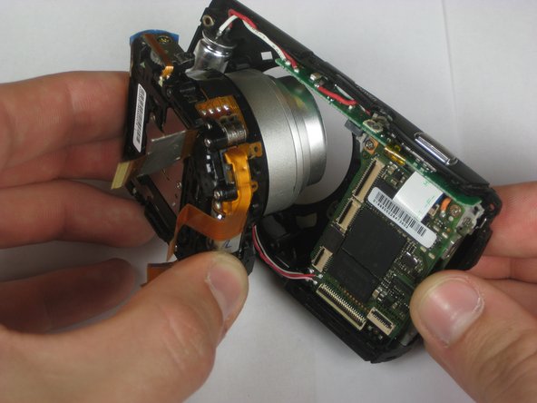 Disassembling Olympus Stylus 1010 Logic Board: step 10, image 1 of 2