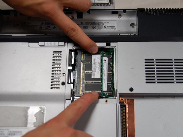 HP Pavilion dv1000 Back Cover Replacement: step 11, image 1 of 2