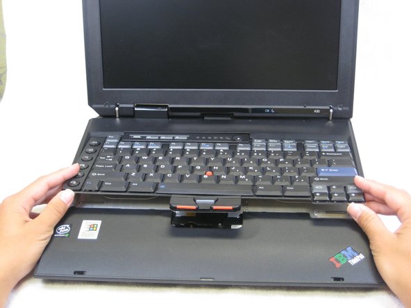 Disassembling IBM ThinkPad A30 Speakers: step 5, image 1 of 3