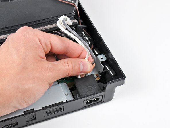 PlayStation 3 Slim AC Inlet Replacement: step 11, image 1 of 2