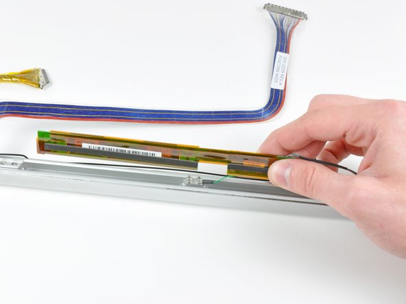 PowerBook G4 Aluminum 17" 1.67 GHz (High-Res) Front Display Bezel Replacement: step 58, image 2 of 2