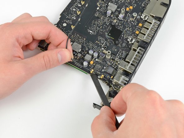 Mac Mini Mid 2011 I/O Bezel Replacement: step 23, image 2 of 2