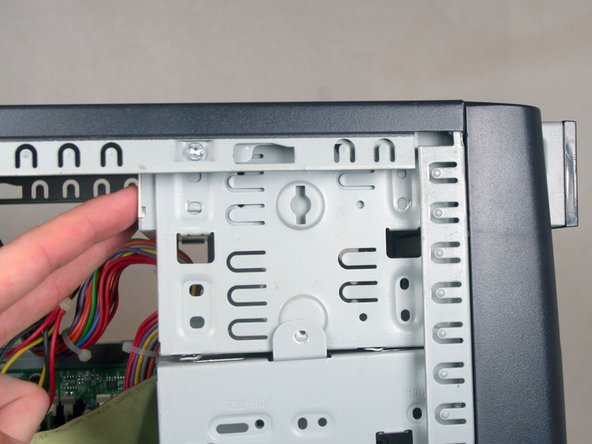 Removing the HP Compaq dx2000MT Optical (CD) Drive: step 8, image 1 of 3