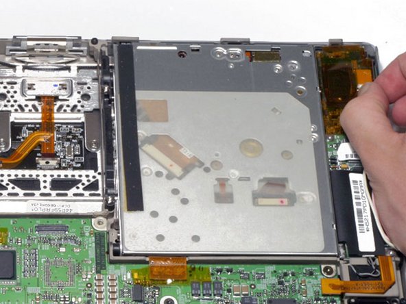 PowerBook G4 Titanium DVI PC Card Cage Replacement: step 13, image 1 of 1