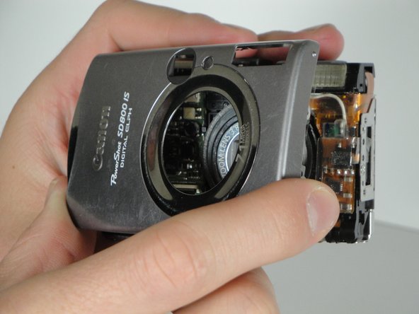 Disassembling Canon PowerShot SD800 IS Lens Assembly: step 7, image 1 of 1