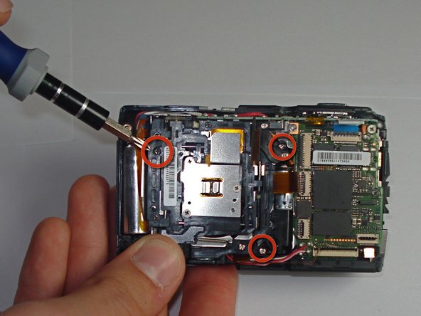 Disassembling Olympus Stylus 1010 Logic Board: step 9, image 1 of 1