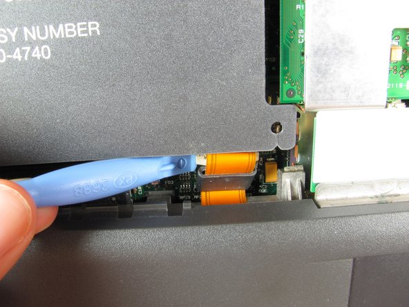 PowerBook 3400 M3553 Track Pad Panel Replacement: step 8, image 1 of 2