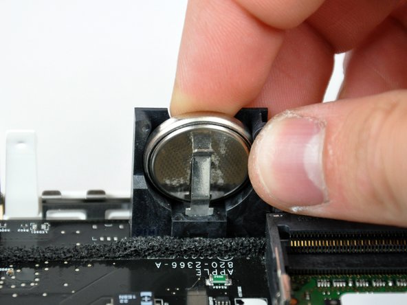 Mac mini Model A1283 PRAM Battery Replacement: step 13, image 1 of 2
