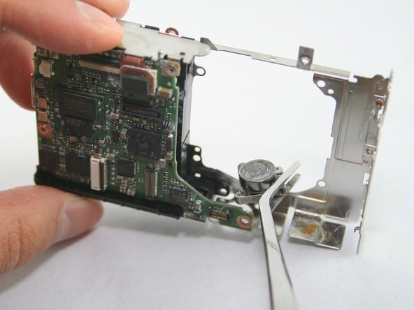 Disassembling Canon PowerShot SD1100 IS AV port and Logic board: step 22, image 2 of 2