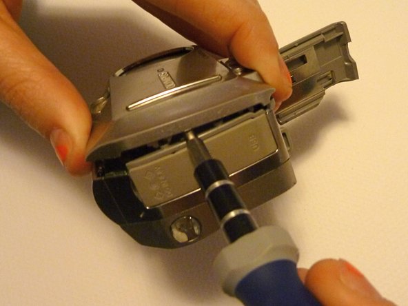 Olympus D590 Retainer Clip Replacement: step 6, image 1 of 1