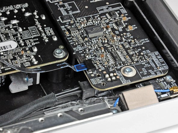 iMac Intel 21.5" EMC 2308 Left Speaker Replacement: step 6, image 2 of 3