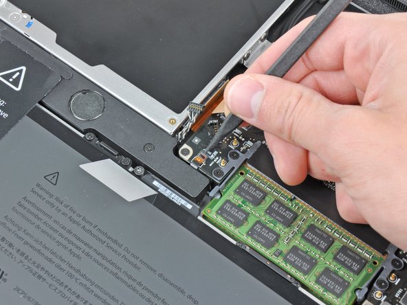 MacBook Pro 17" Unibody Left Speaker Replacement: step 14, image 1 of 2