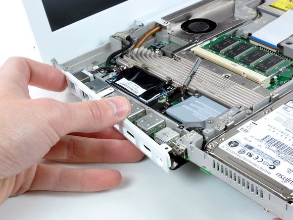 iBook G4 14" 1.42 GHz I/O Bezel Replacement: step 31, image 1 of 1