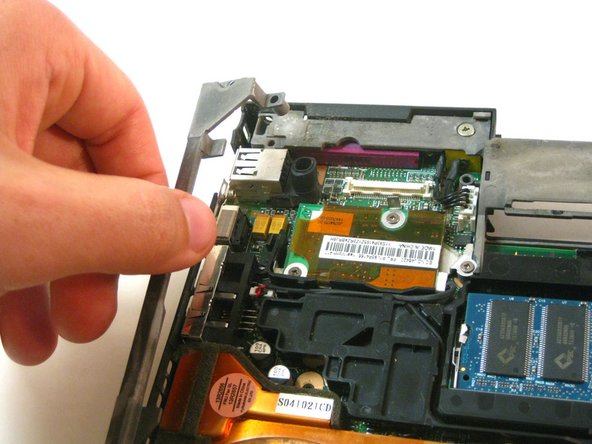 Disassembling IBM ThinkPad T42 Lower Bracket: step 5, image 1 of 1