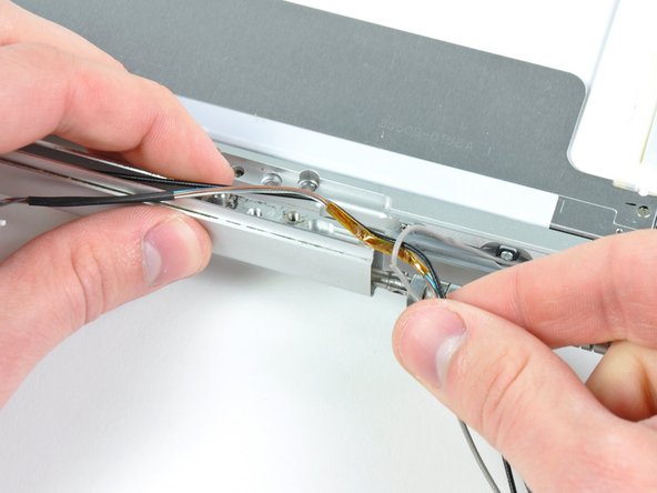 PowerBook G4 Aluminum 17" 1.67 GHz (High-Res) Inverter Cable Replacement: step 53, image 1 of 1